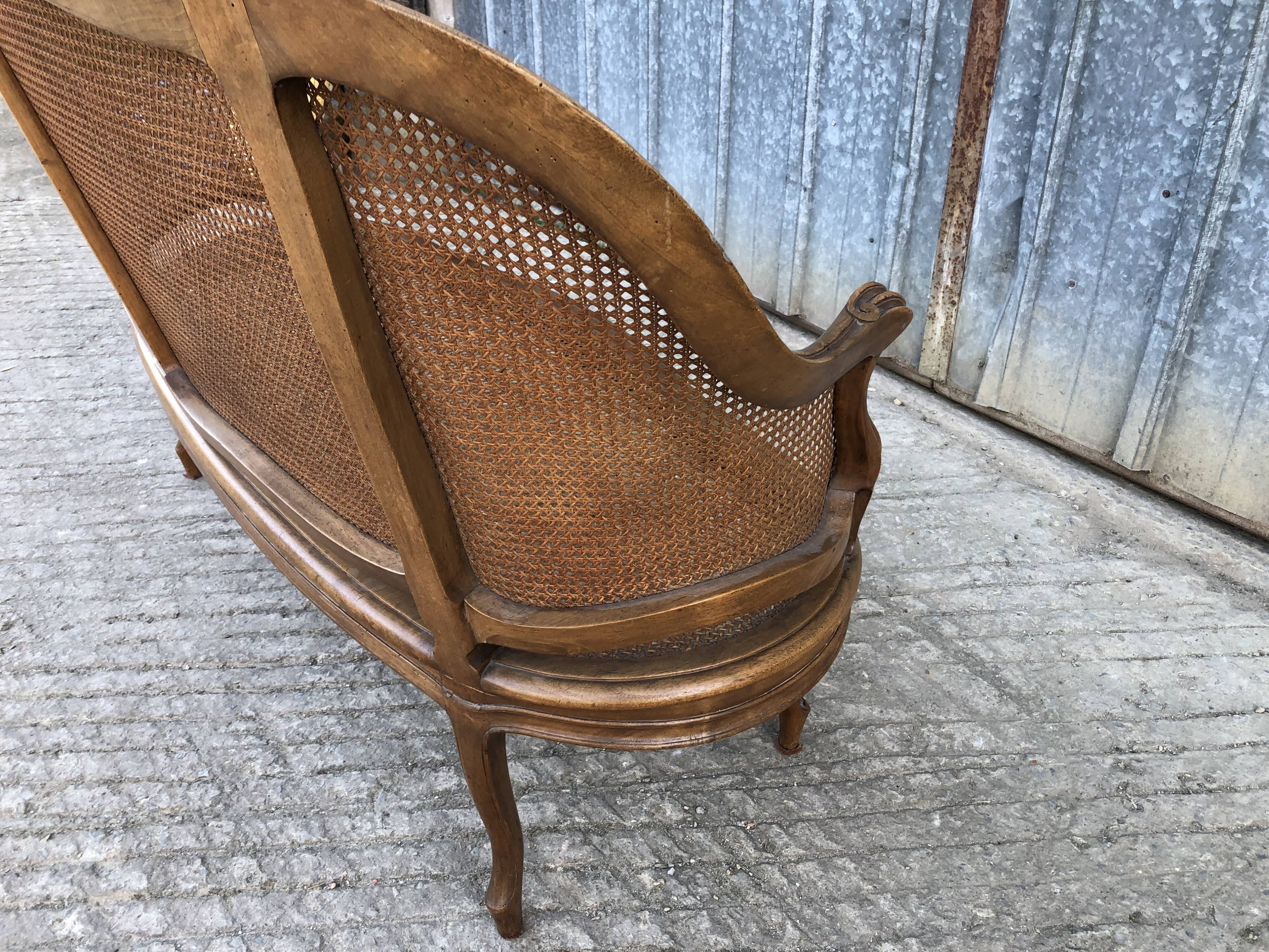 Antique Louis XV bench in solid walnut and caning