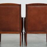 Ensemble majestueux et luxueux de 2 fauteuils design Art Déco en cuir de vachette couleur cognac