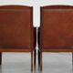 Majestic, luxurious set of 2 cognac-colored cowhide leather Art Deco design armchairs