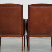 Majestic, luxurious set of 2 cognac-colored cowhide leather Art Deco design armchairs