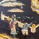 Chinese black lacquer coffee table with figurative decoration – Coromandel style – 20th century.