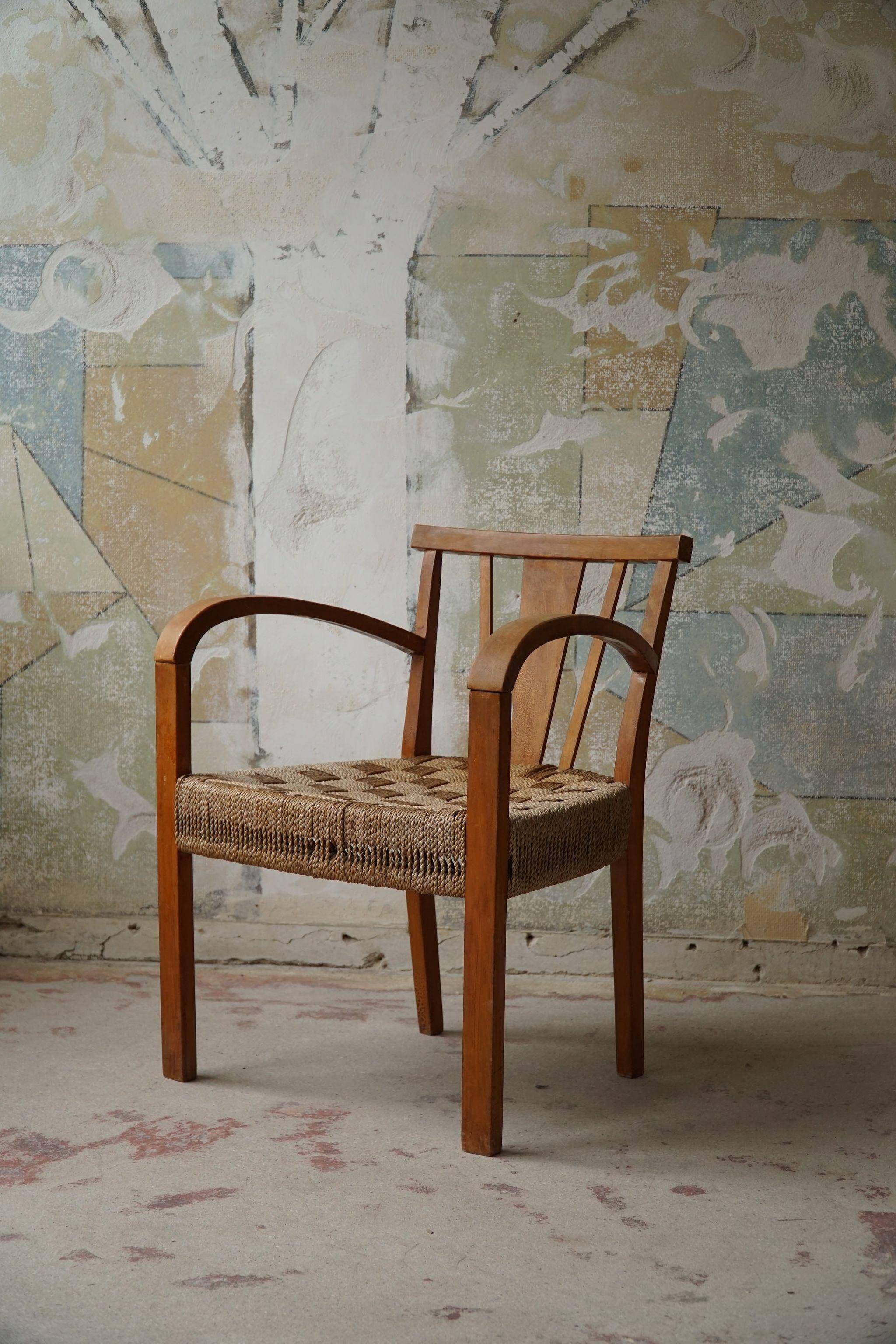 Modern Danish lounge chair in beech and paper cord, in the style of Frits Schlegel.