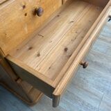 Wooden chest of drawers with changing table