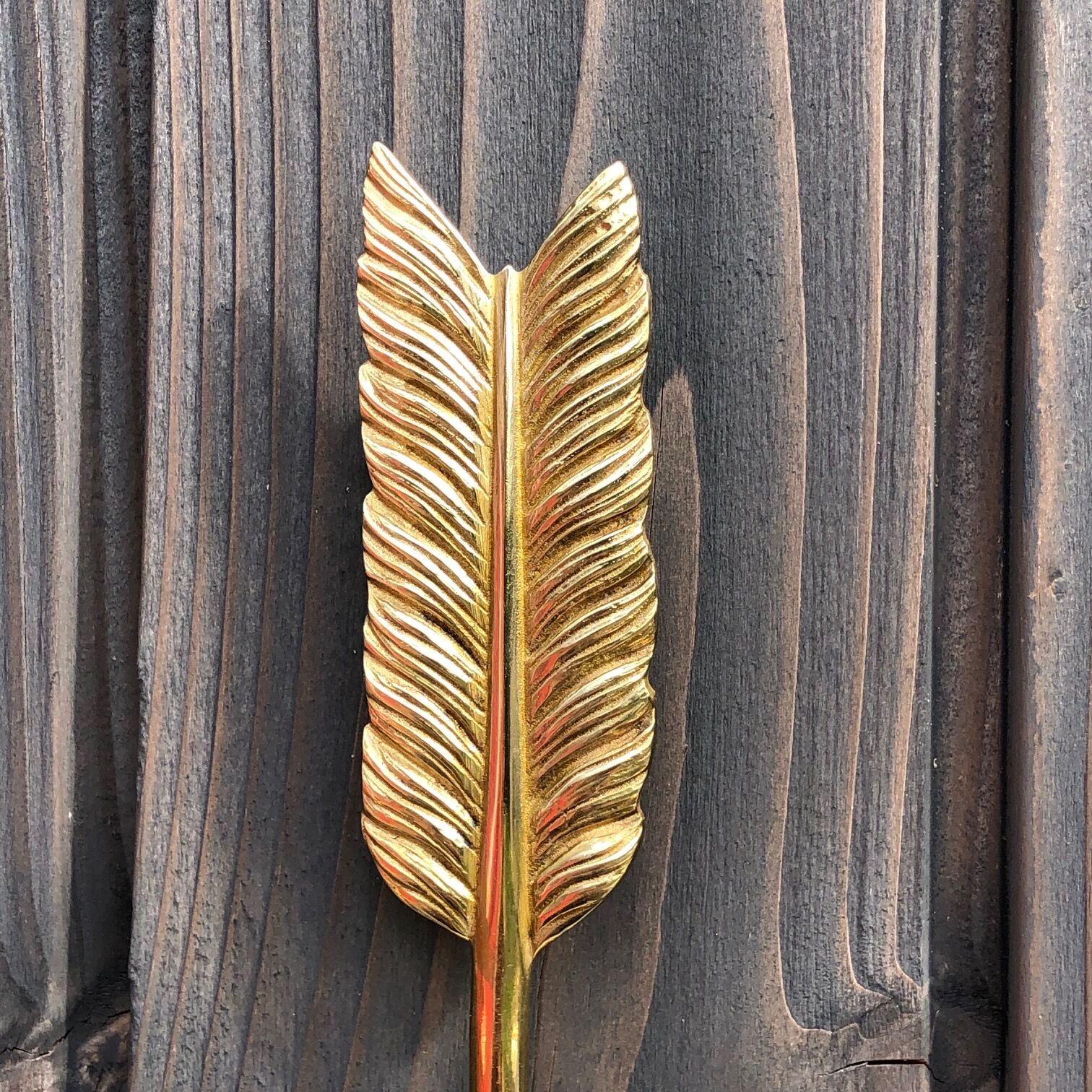 Pair of wall lamps decorated with bronze arrows "Cupid"