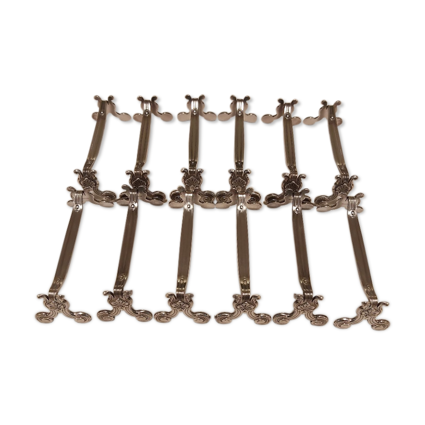 Ensemble de 12 porte-coûteaux Christofle métal argenté