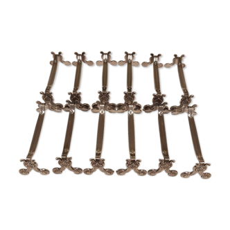 Ensemble de 12 porte-coûteaux Christofle métal argenté