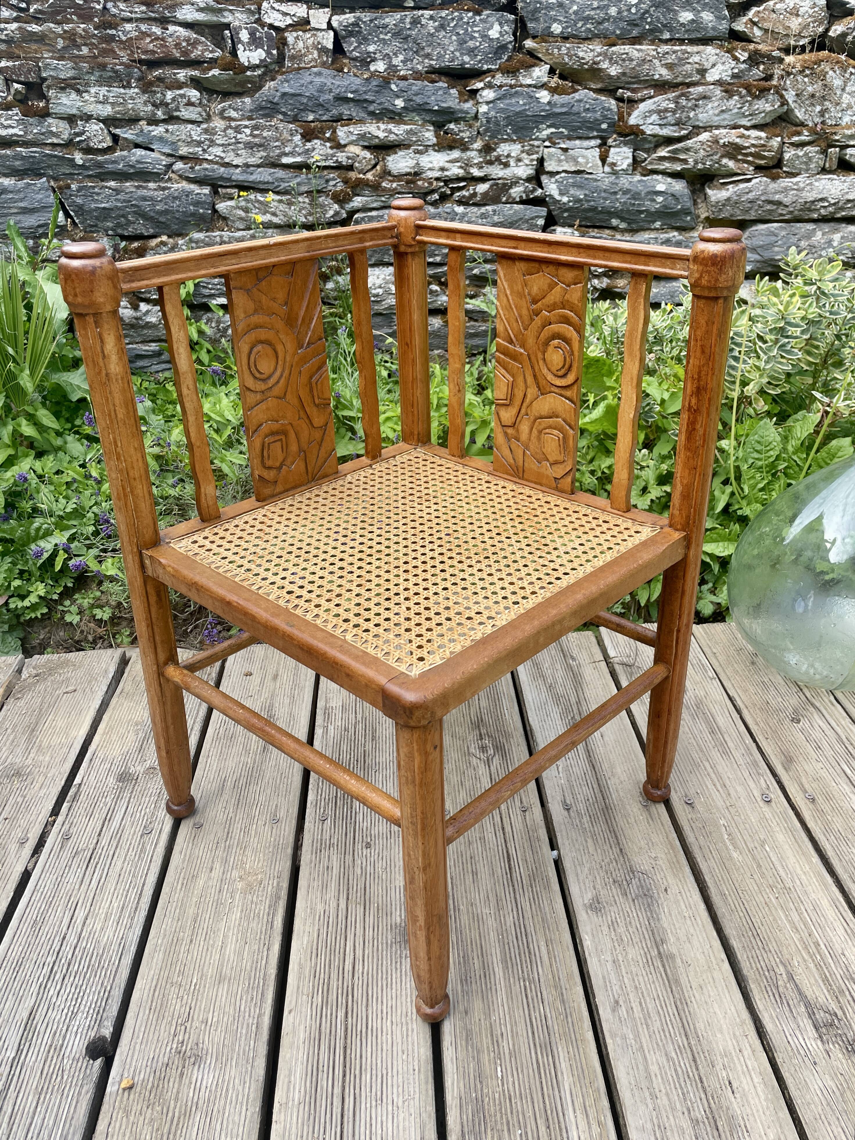 Art Deco corner chair with caning