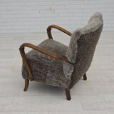 1960s, reupholstered Danish armchair, New Zealand genuine sheepskin.
