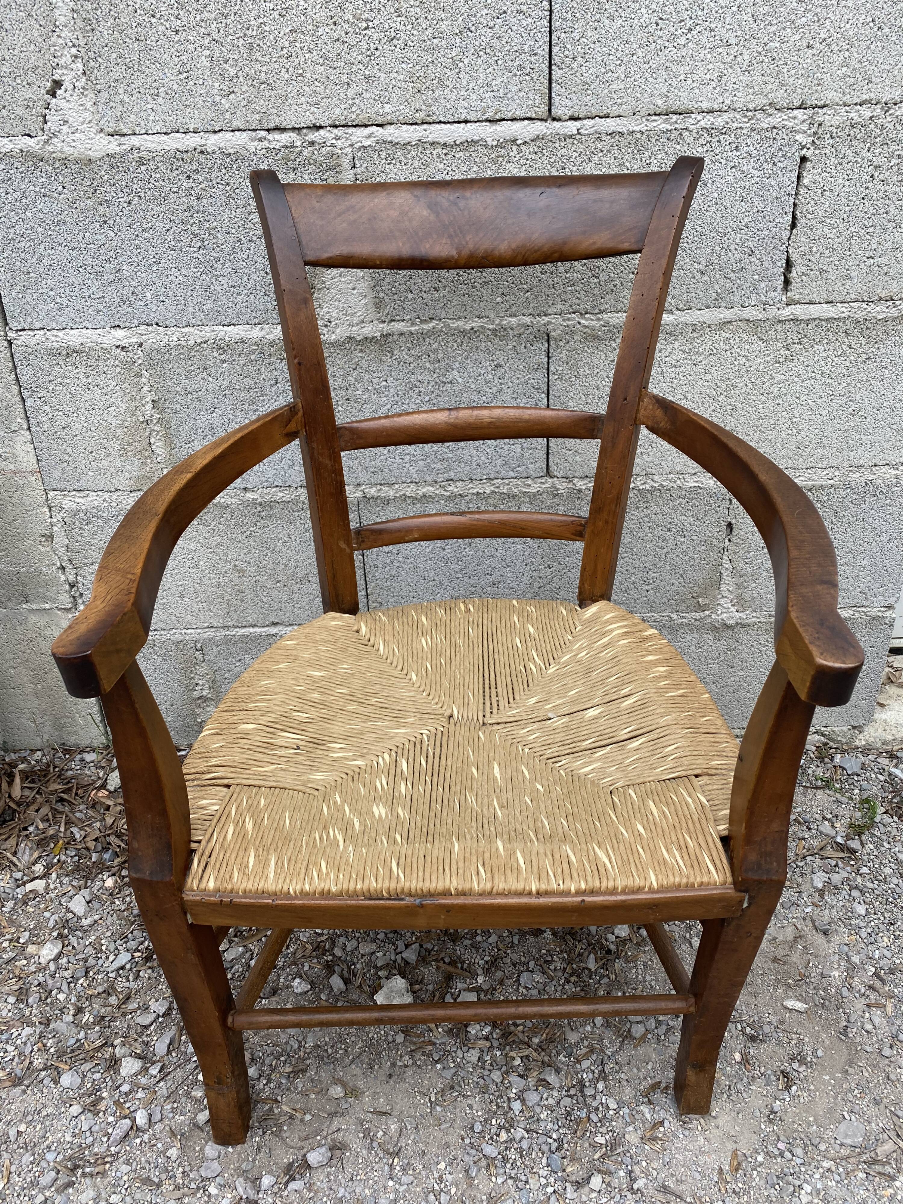 Antique straw armchair