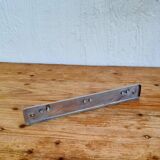 Vintage chrome wall coat rack with three hooks.