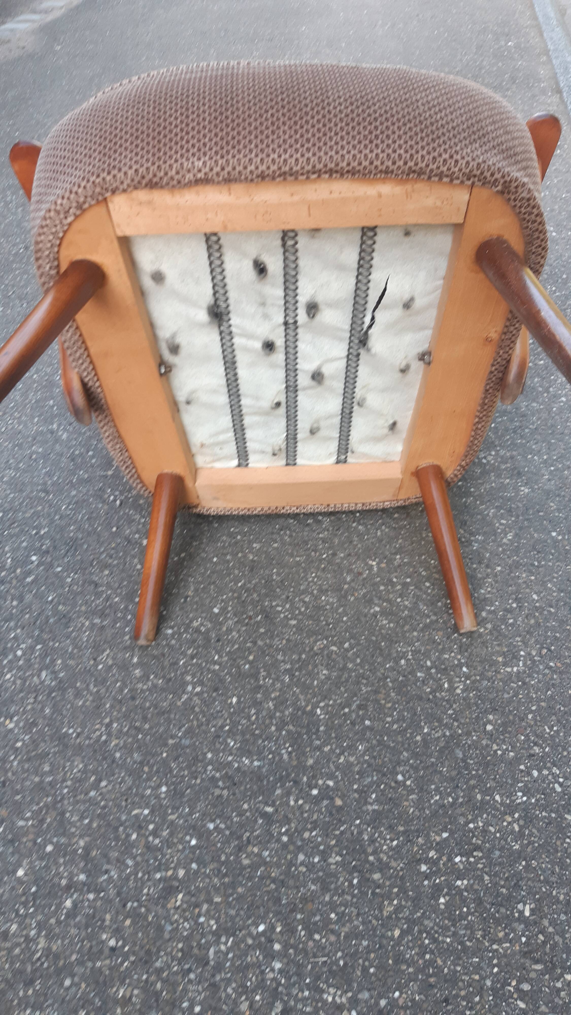 Cocktail armchair with armrests