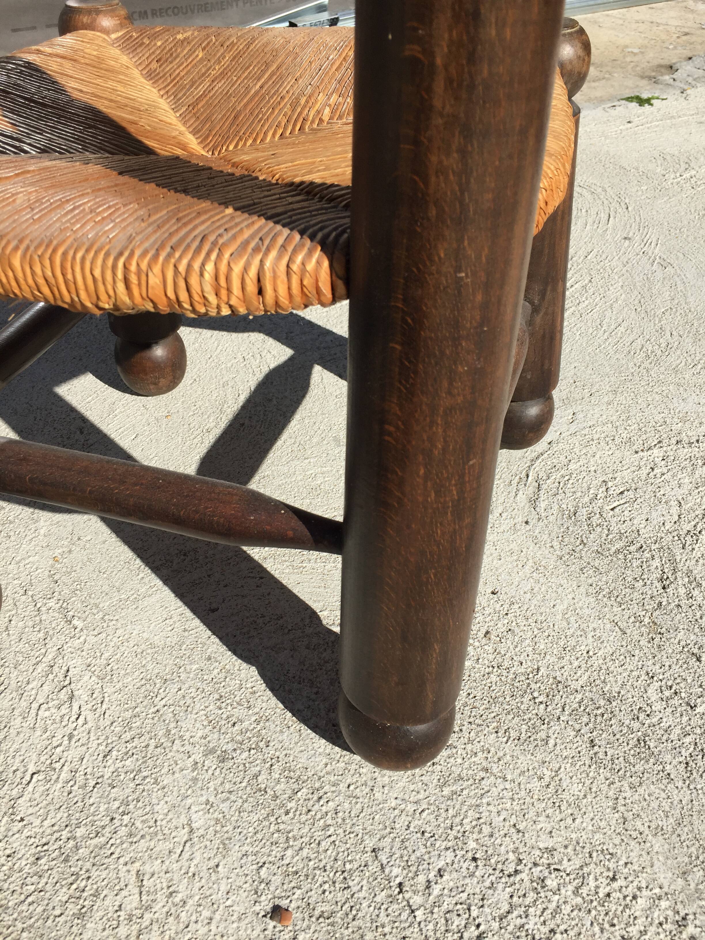 Straw low chair in the style of Charles Dudouyt