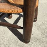Straw low chair in the style of Charles Dudouyt