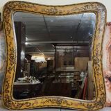 Important rectangular Venetian mirror with a richly painted wooden frame.