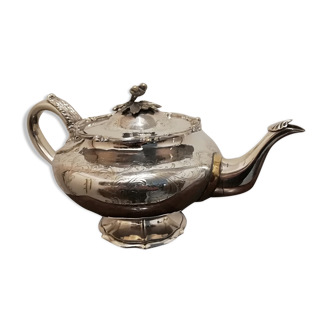 Silver metal teapot crowned R&C punch