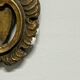 Pair of mirrors in wood decorated with gold leaf.
