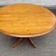 Round table in solid pine with a central baluster leg from 1980.