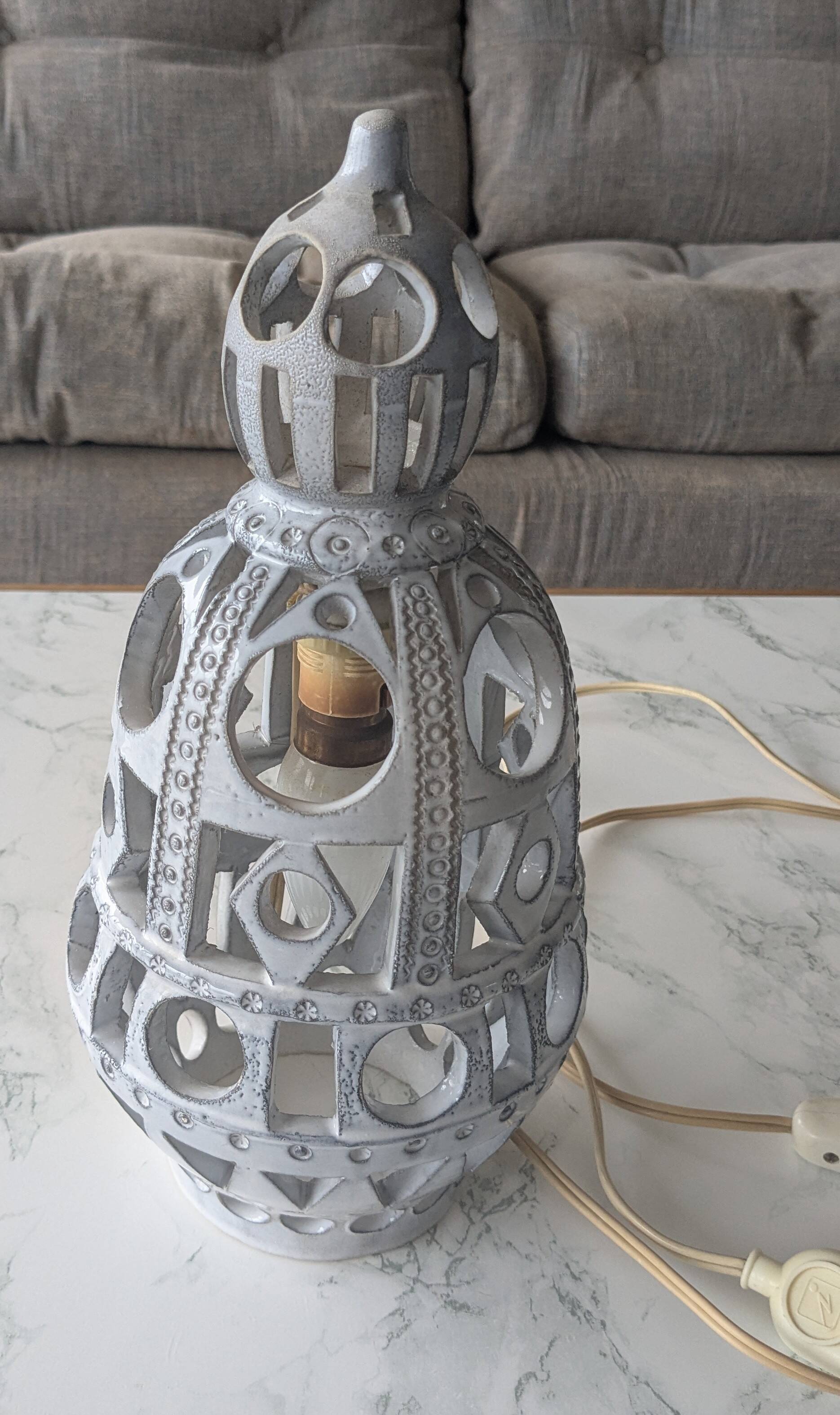 Ceramic lamp with cut-out design in the style of Roger Collet, 1960s.