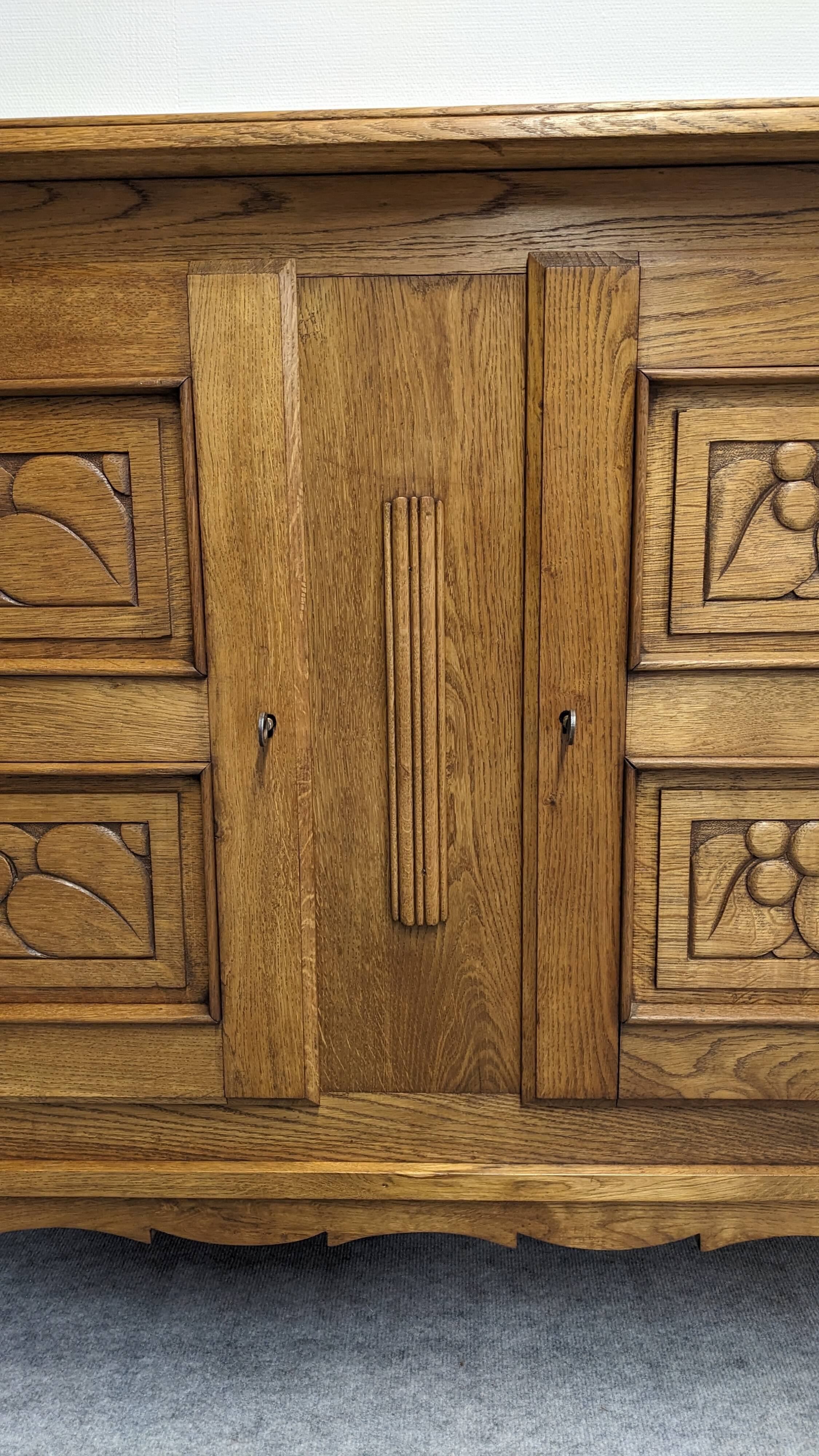 Brutalist oak sideboard attributed to Joseph Savina, France circa 1950.