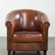 Vintage sheepskin club armchair in English style with deep colours