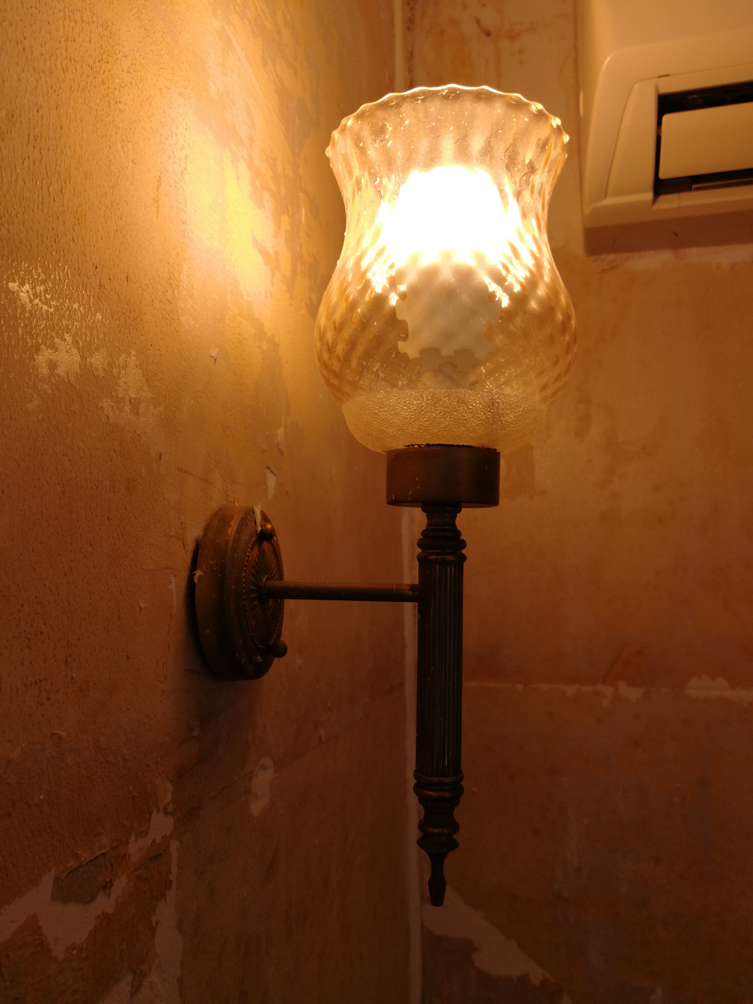 Glass and brass sconces