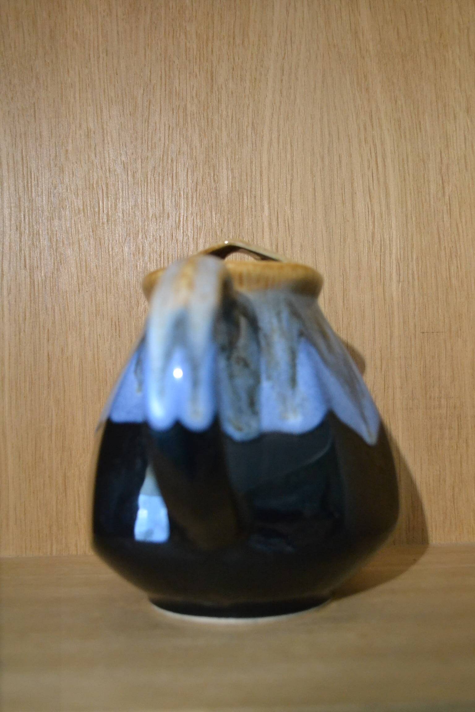 Blue flamed stoneware jug