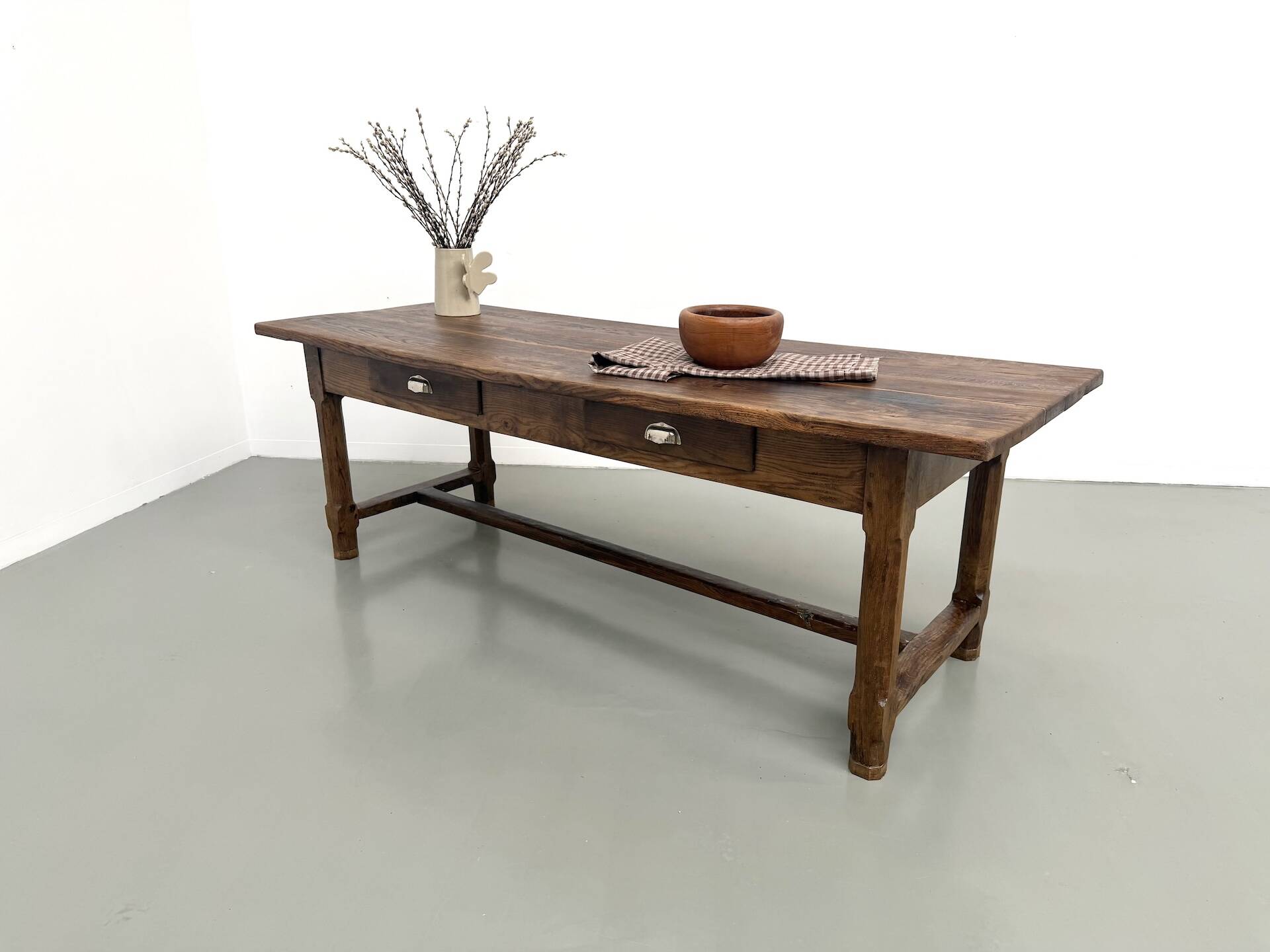 Authentic French farmhouse table from 1890 in solid oak with two drawers.