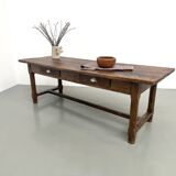 Authentic French farmhouse table from 1890 in solid oak with two drawers.