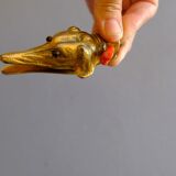 Ancient greyhound-headed mail clip, bronze