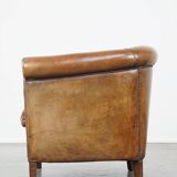 Club chair made of sheepskin leather with the most beautiful colors and a stunning patina