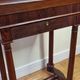 Old Empire period console in mahogany and veneer wood with bowl top