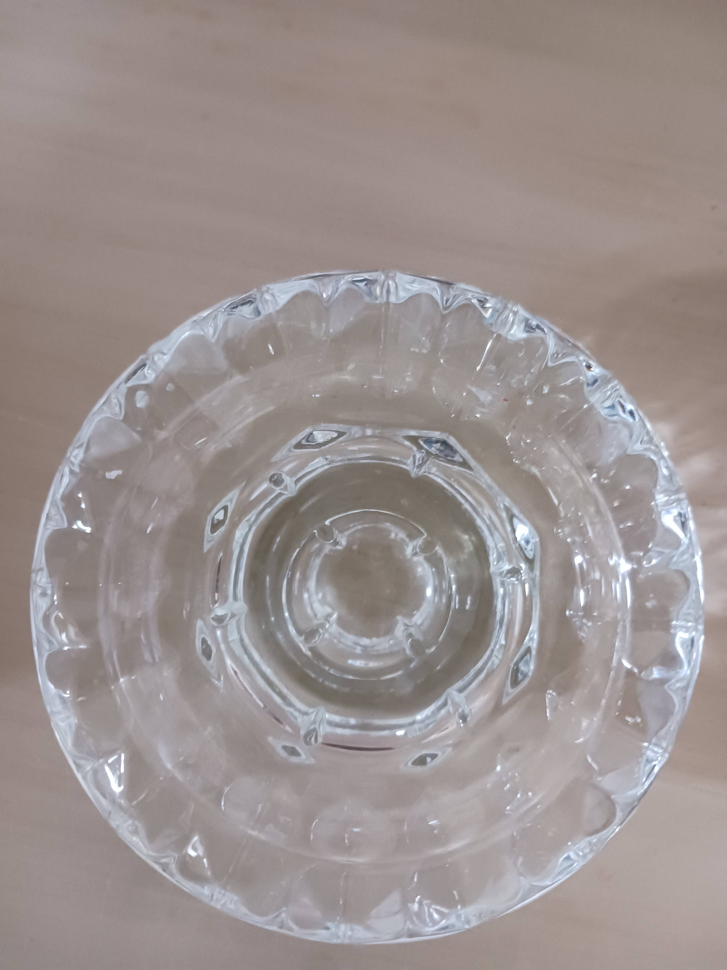 Moulded glass candle holders.