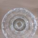 Moulded glass candle holders.