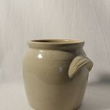 Beige glazed stoneware pot with handle