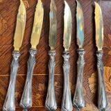 Set of knives and forks for fruits.