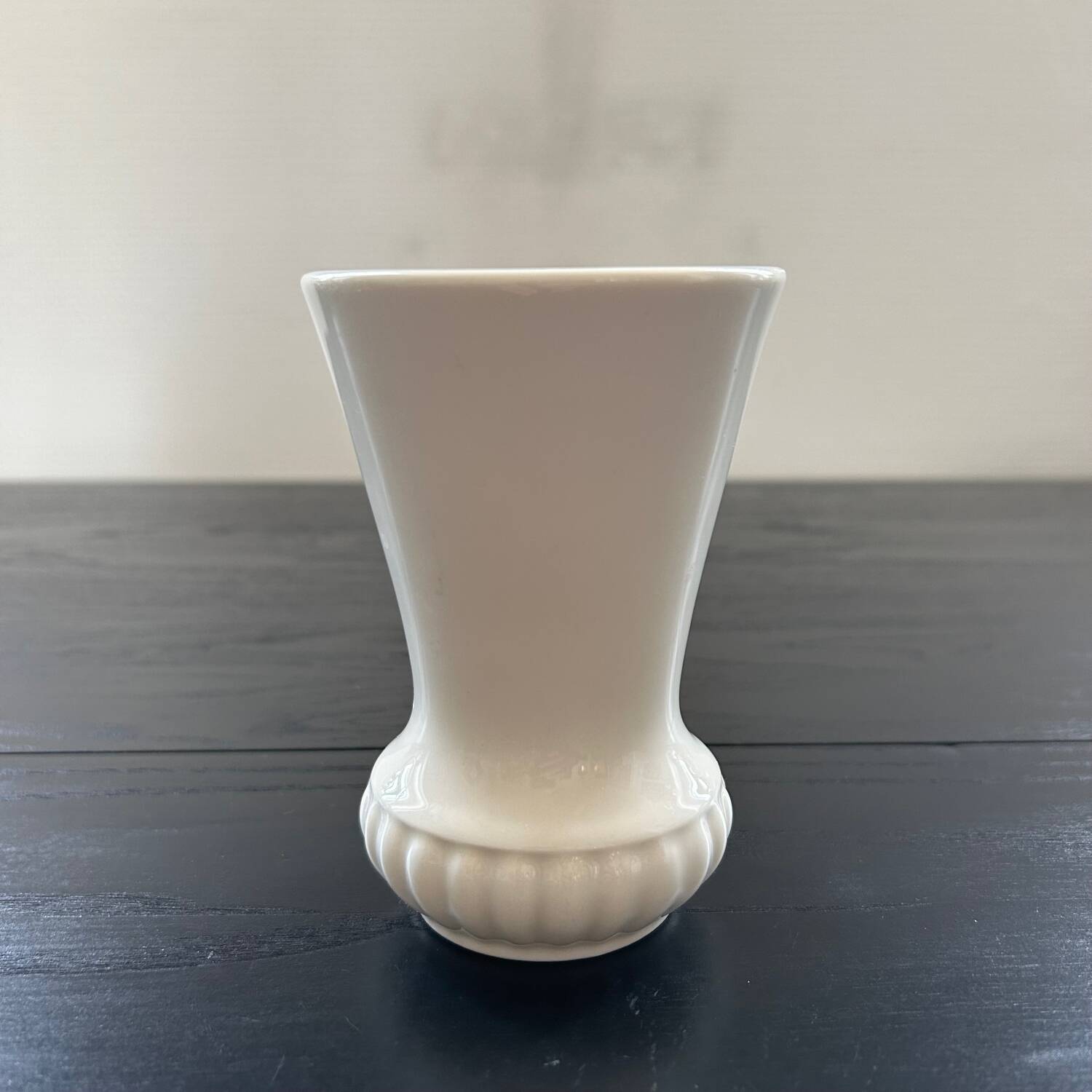 Small ribbed white vase