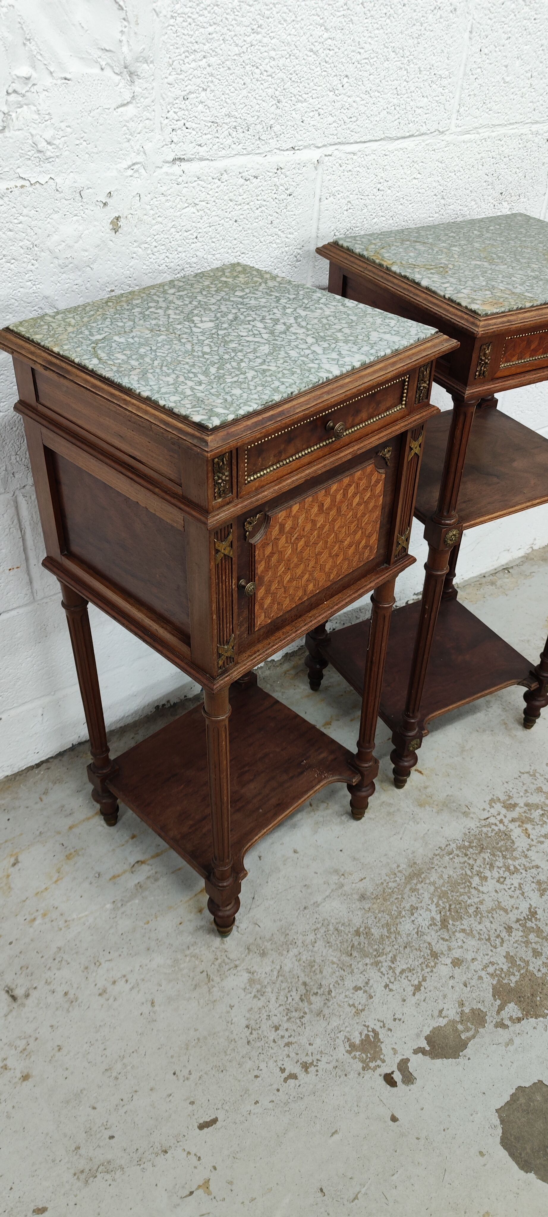 Pair of bedside old marquetry top green marble and bronze decorations
