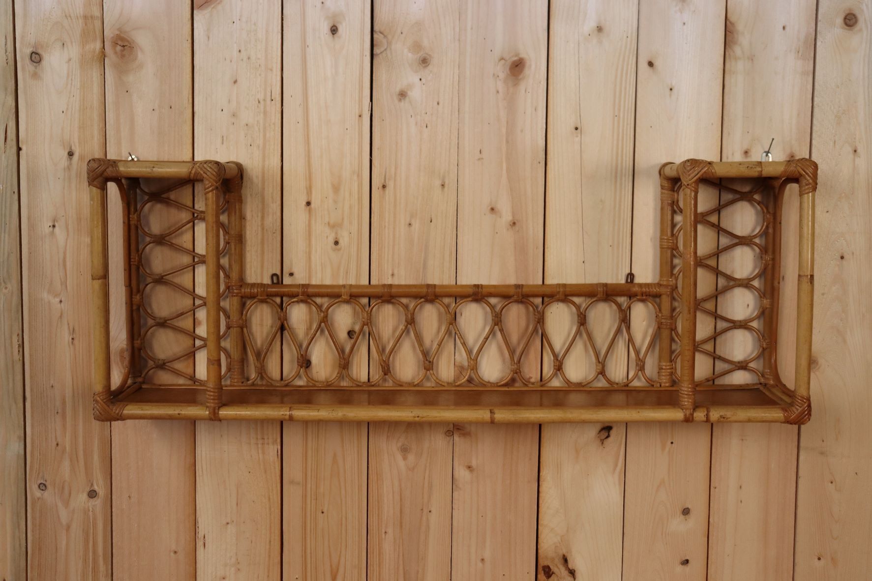 Rattan wall shelf
