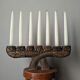 Hand-carved wooden candle holder, ethnic tribal style.