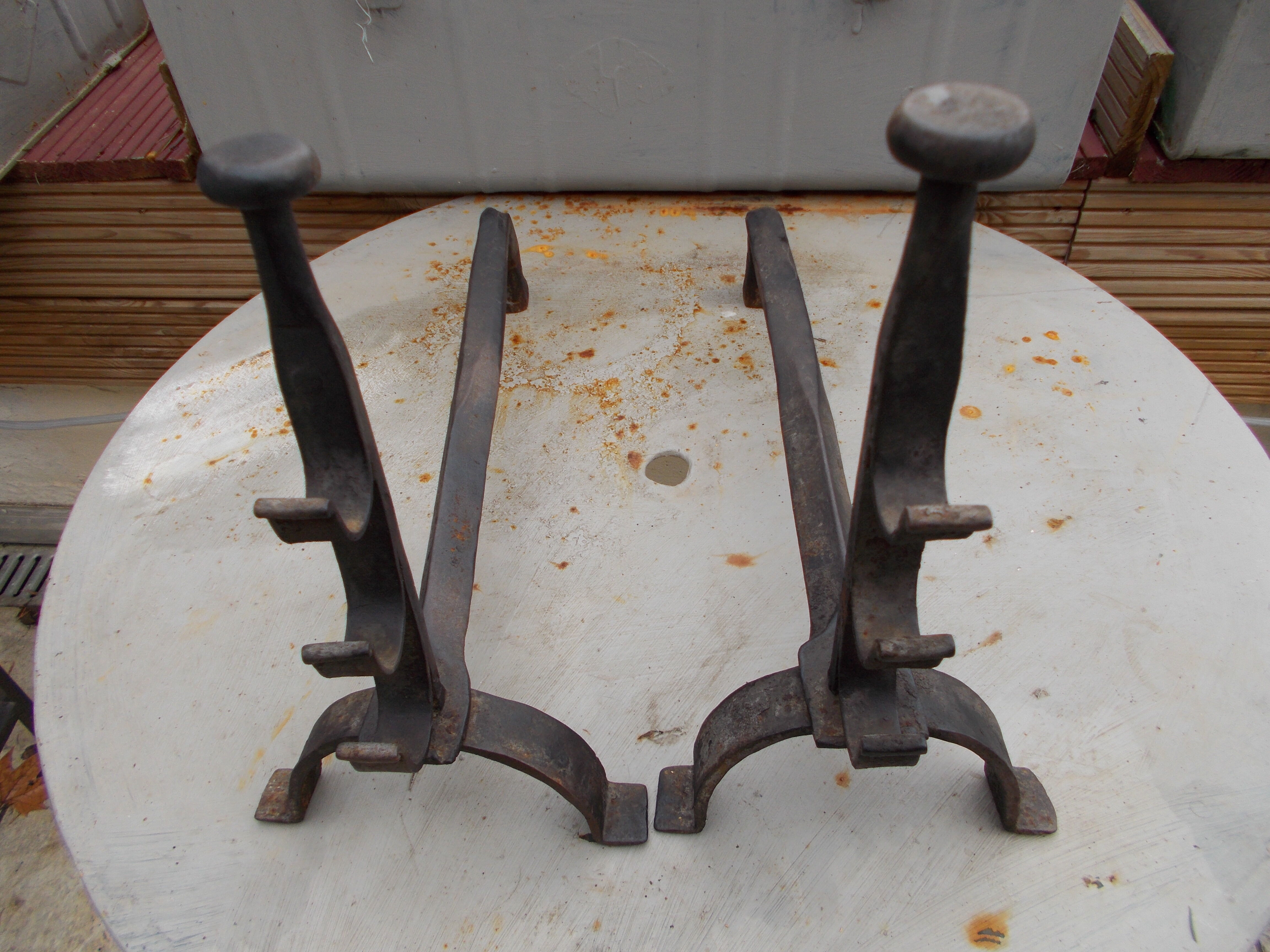 Old pair of wrought iron pegs