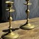 Pair of gilded candlesticks with engraved flower garland motifs H22