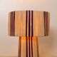 Table lamp in natural raffia with purple stripes
