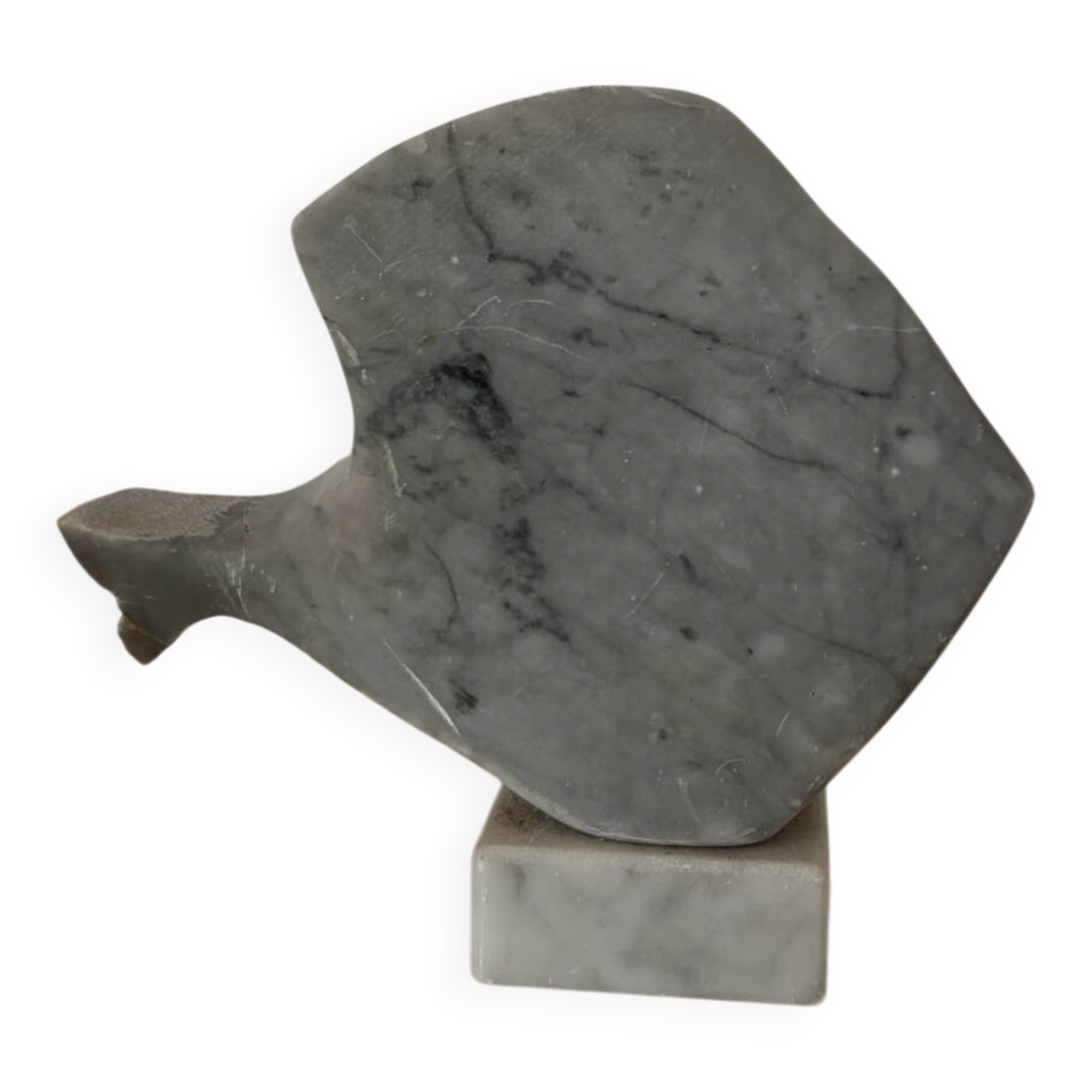 Marble sculpture in the shape of a fish.