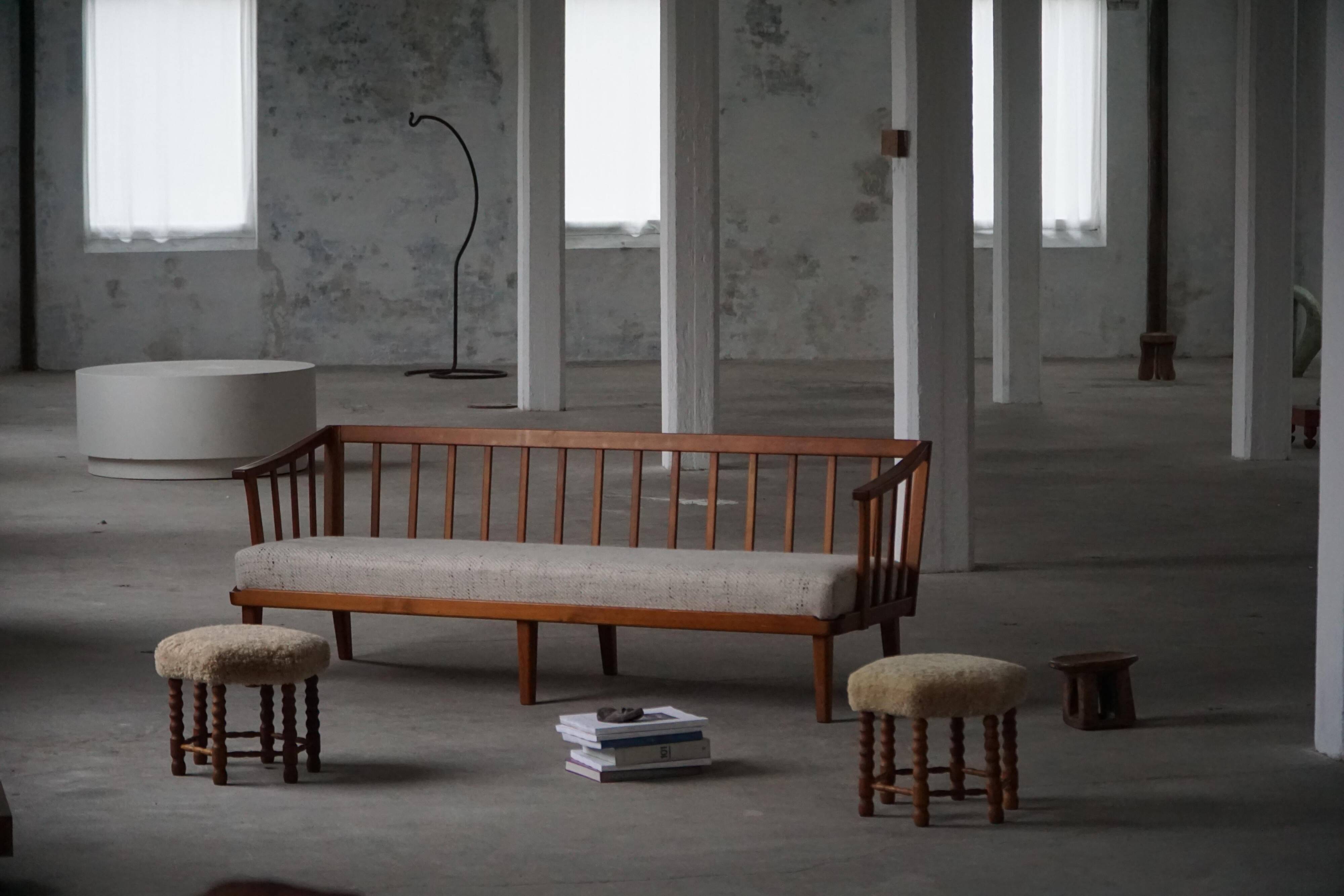 Pair of Danish oak stools from the mid-century with hexagonal seat and turned legs, 1950s.