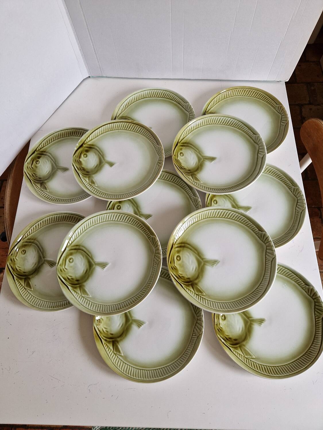 Set of 12 fish plates from the Moulin des Loups factory in Orchies