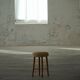 Danish sculptural stool from the mid-century modern period with a lambswool seat, 1960s.