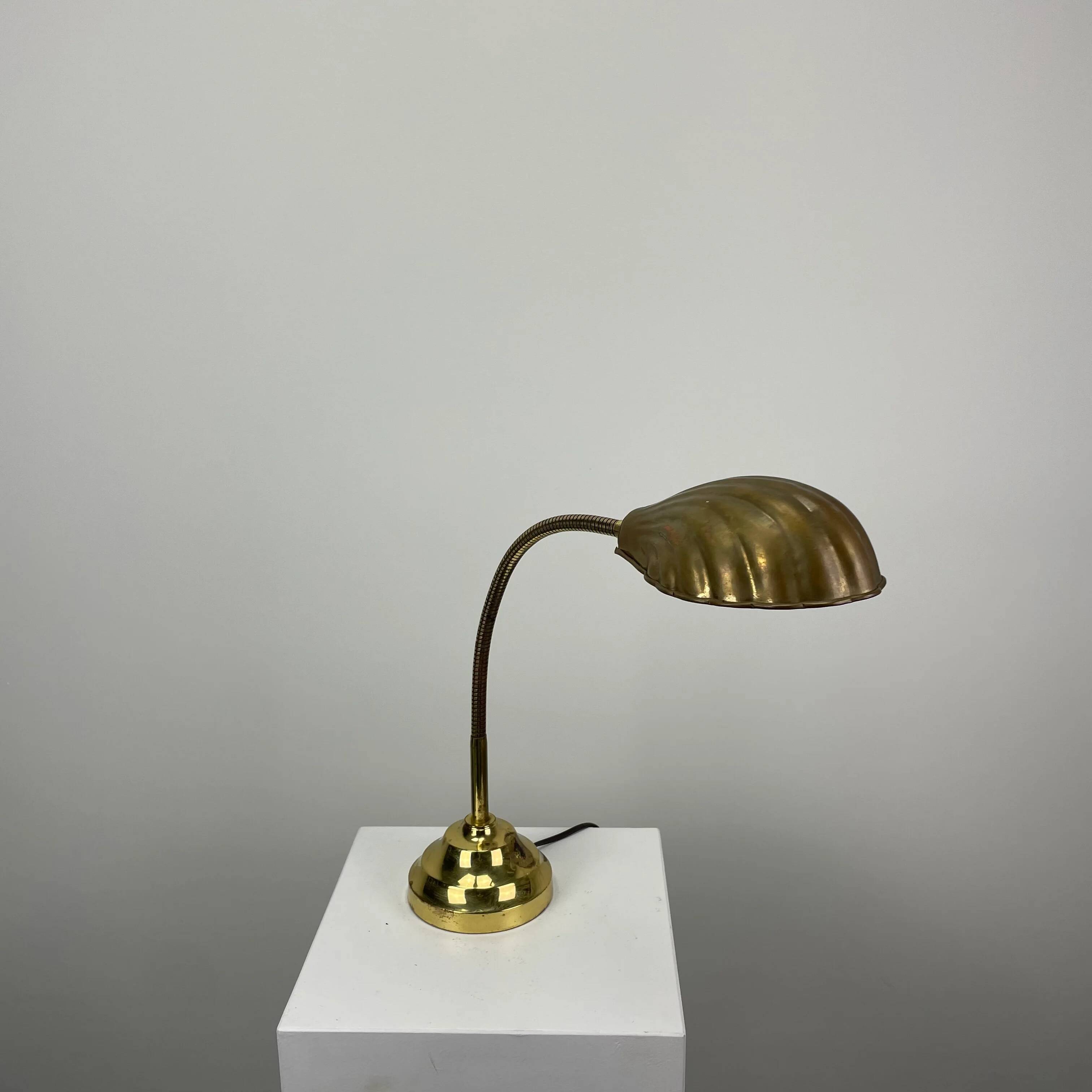 French table lamp in brass with a shell-shaped shade from the 1950s.