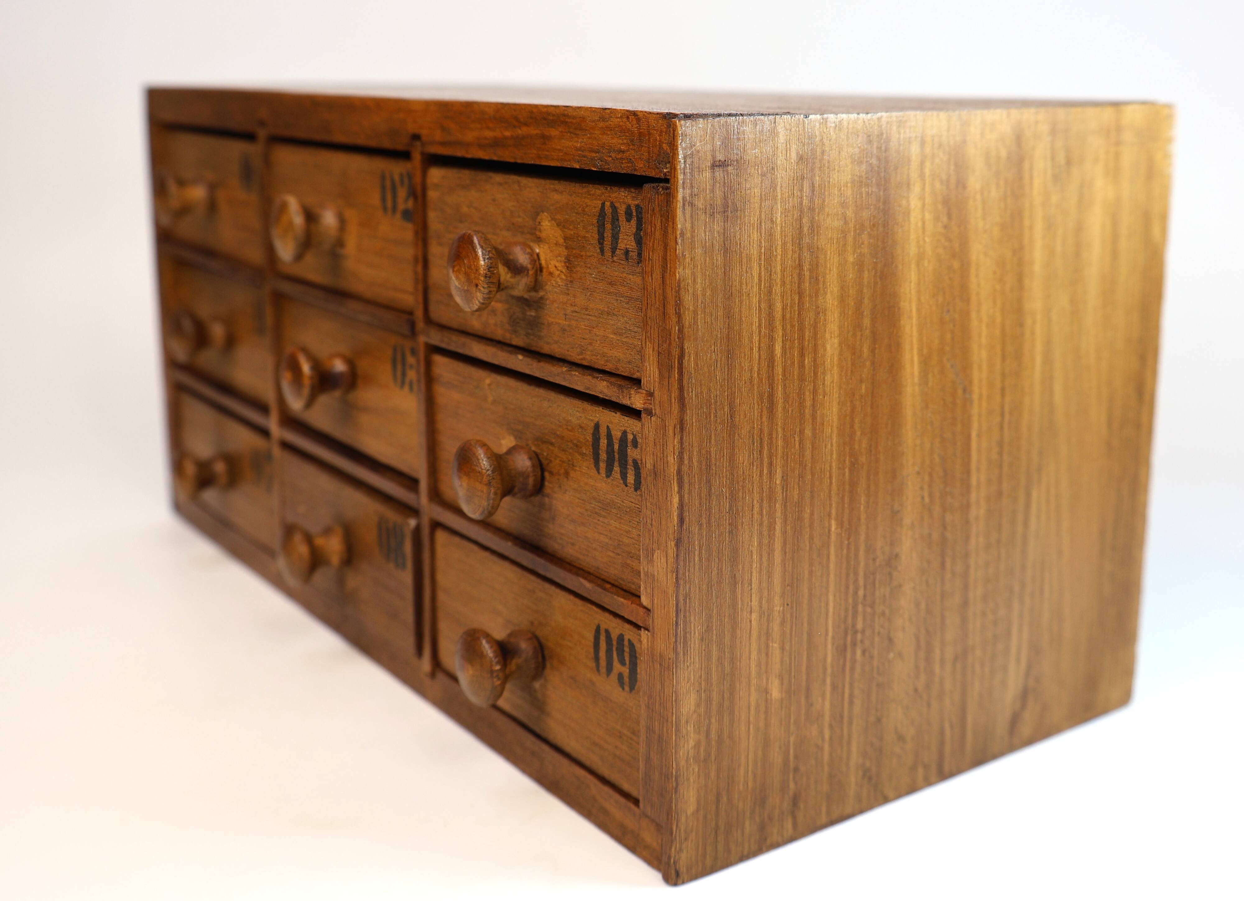 Small drawer unit, vintage wooden watchmaker's chest.