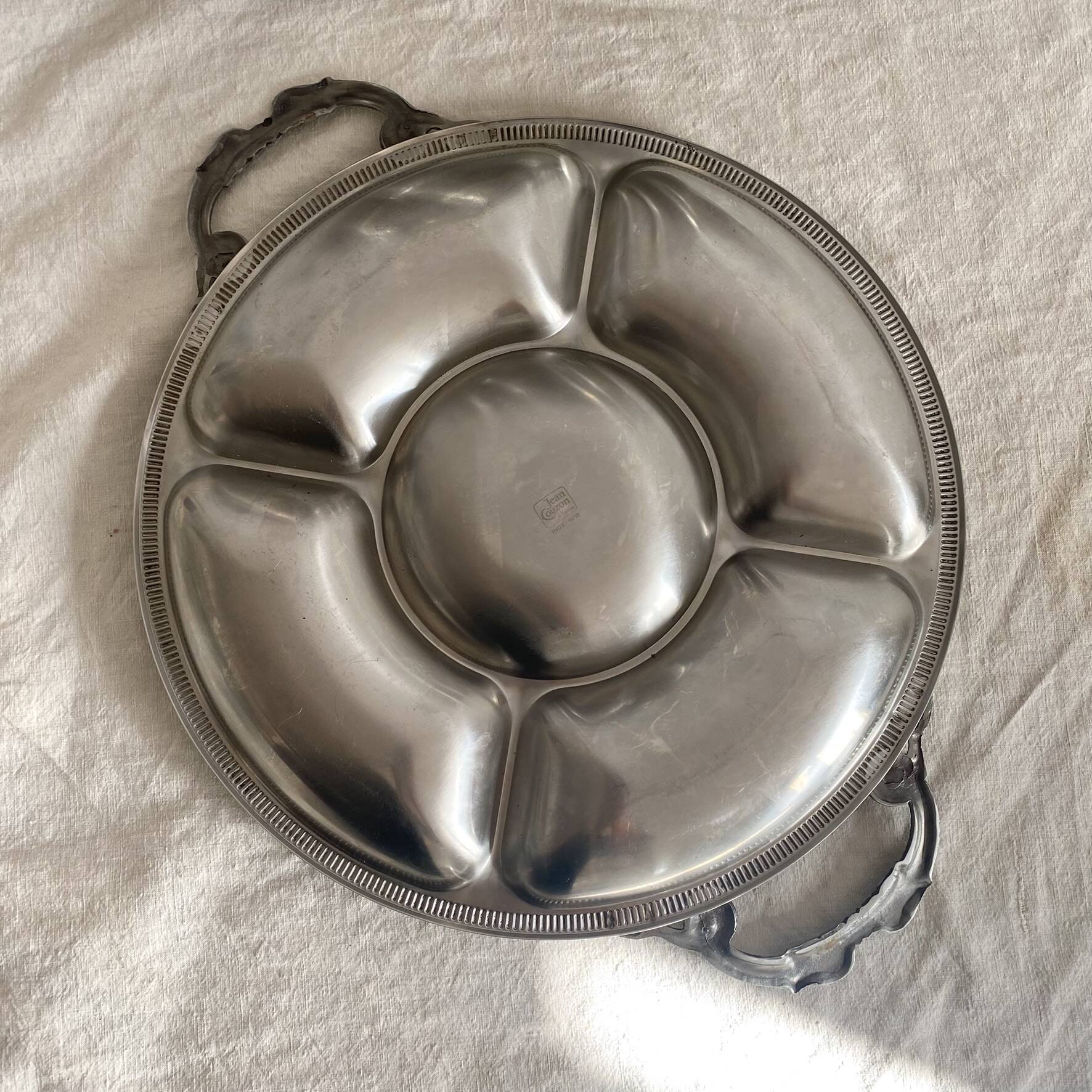 Stainless steel dish Jean Couzon with fish handles