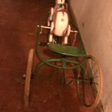 Old pedal horse with sulky